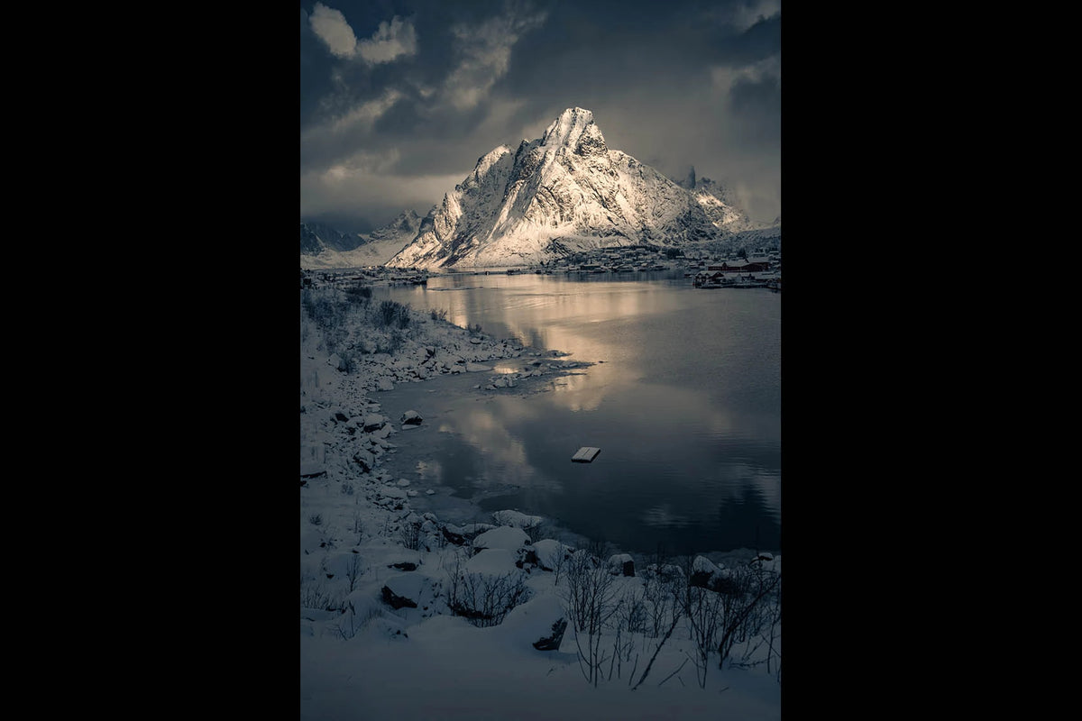 Reine fjordview on white mountain in winter - winter and cold lightroom presets - edited