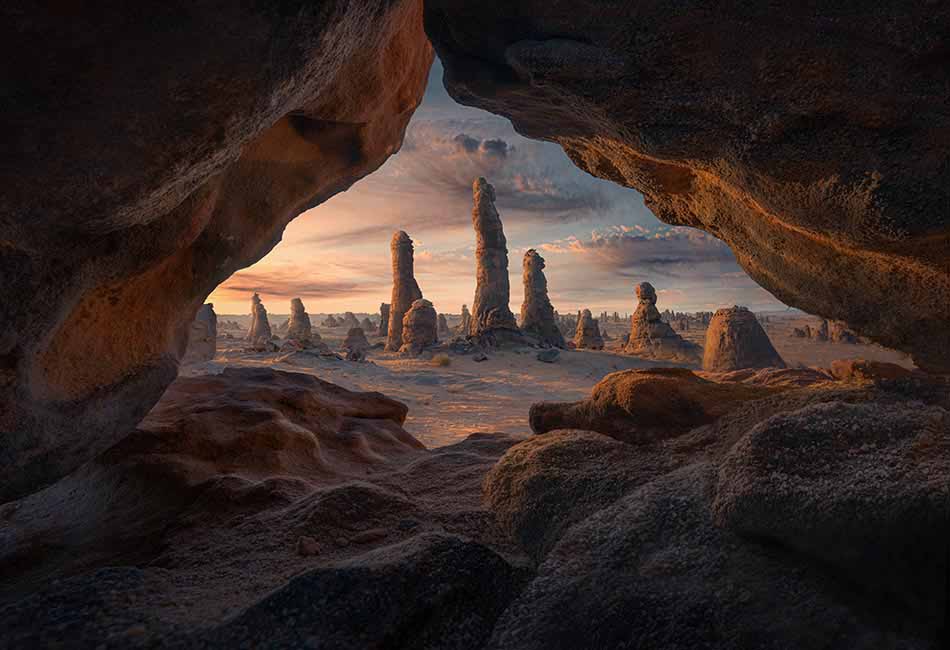 A cave in Alula Saudia Arabia, showing the strange tall shapes of the rocks in the Alula desert.