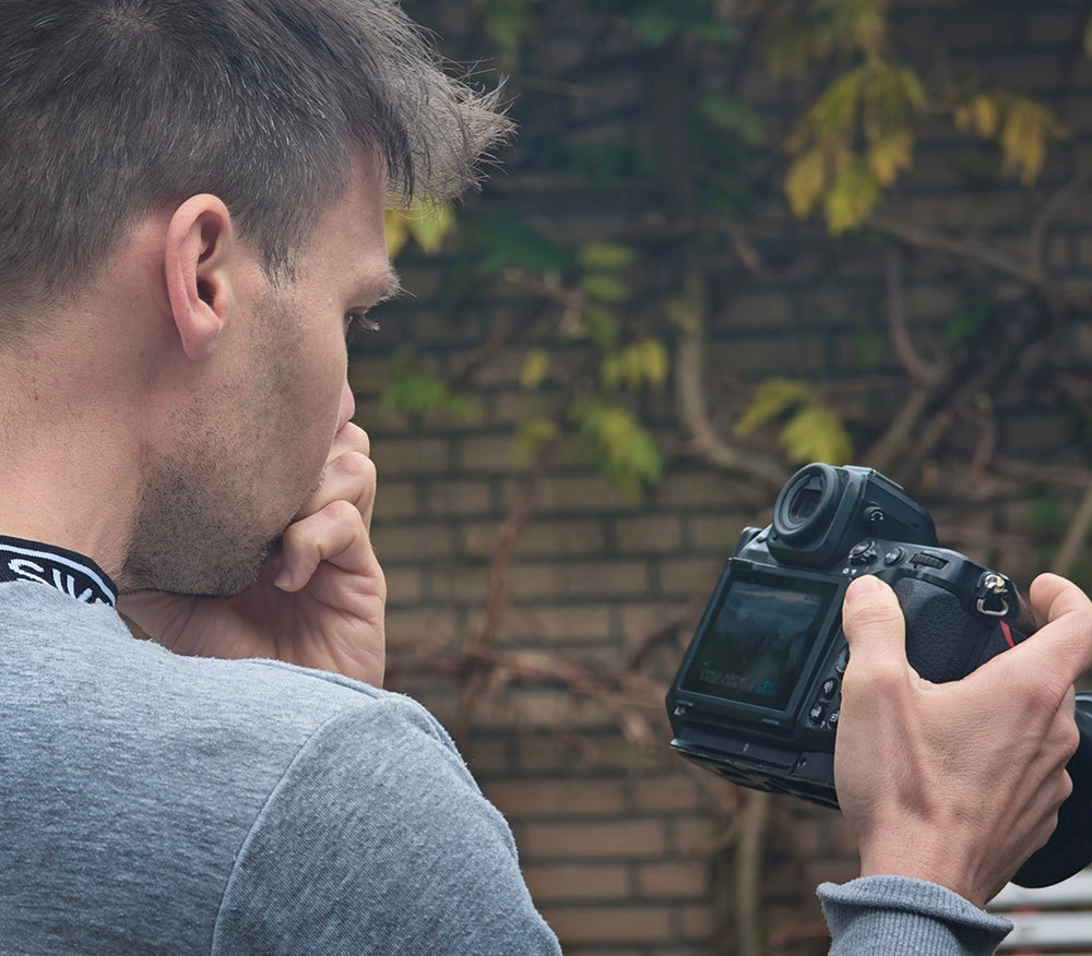 max rive reviews nikon z8 camera during shooting.