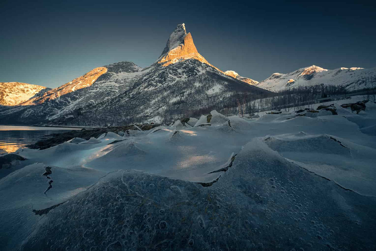 stetinden winter landscape with frozen fjord on foreground - winter and cold lightroom presets - edited