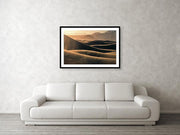 Framed Print hanged on wall of Mesquite flat sand dunes wtih blowing sand at sunrise big size