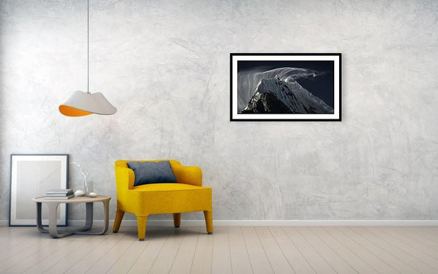 framed print of mountain landscape in peru hanged on wall