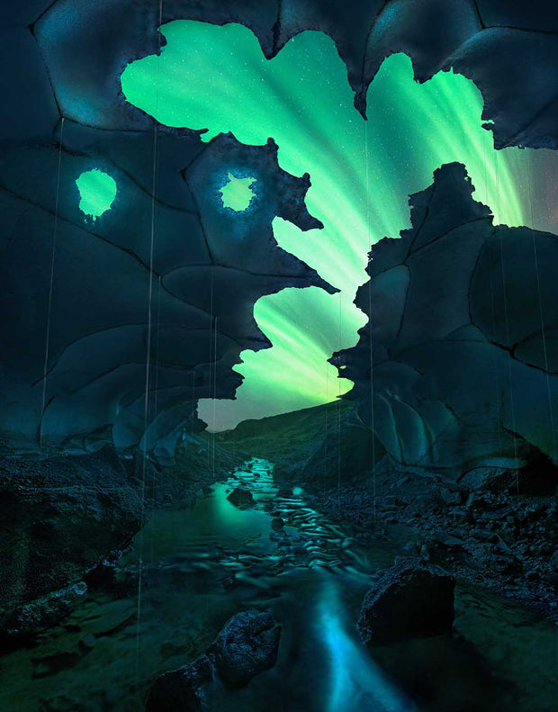 aurora borealis in iceland seen from inside a snowcave