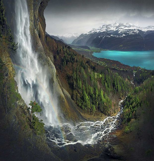 Canvas print of Brienzerzee in the Swiss with waterfall on front, lake and mountains in the back - max rive