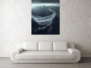 big print hanged in living room of maelifell volcano with dark sky with river delta from the air