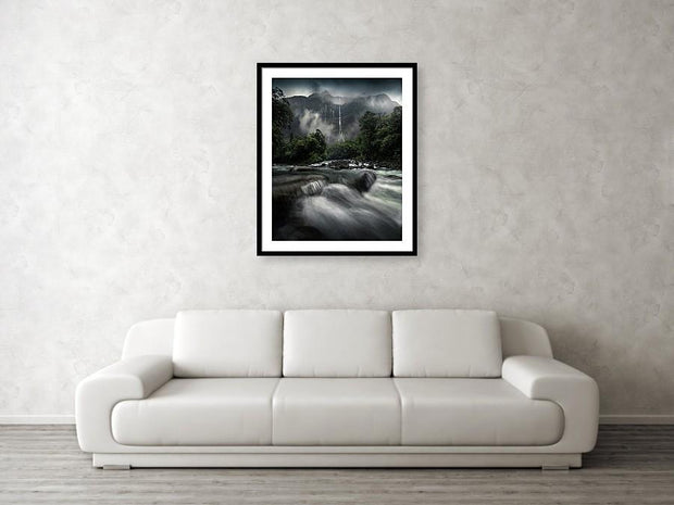 milford sound waterfall framed print hanged on wall
