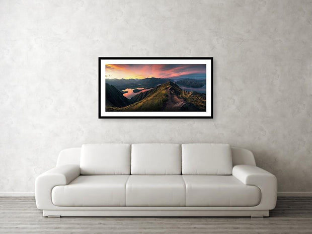 framed print of roys peak panorama at sunset hanged on wall