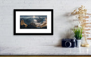 framed print hanged on wall of a swiss landscape in small size